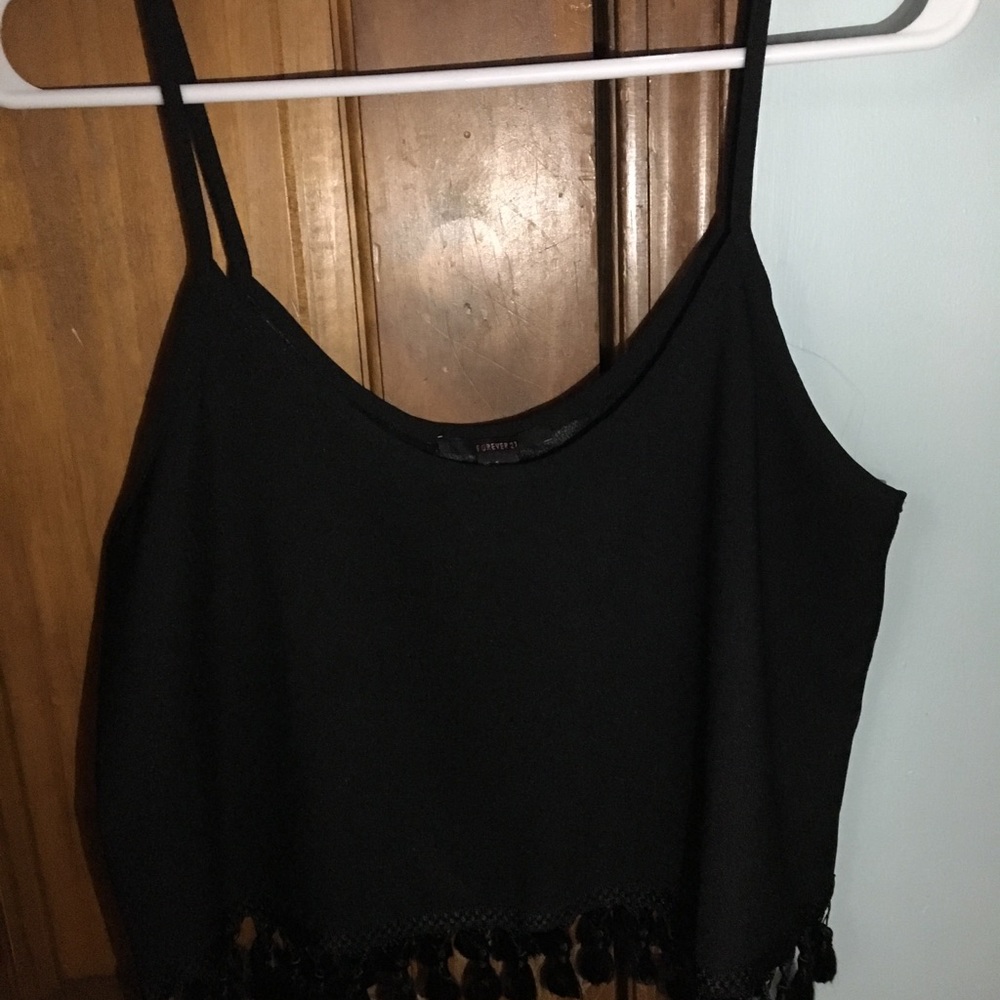 Cropped black tank top with fringe at the bottom